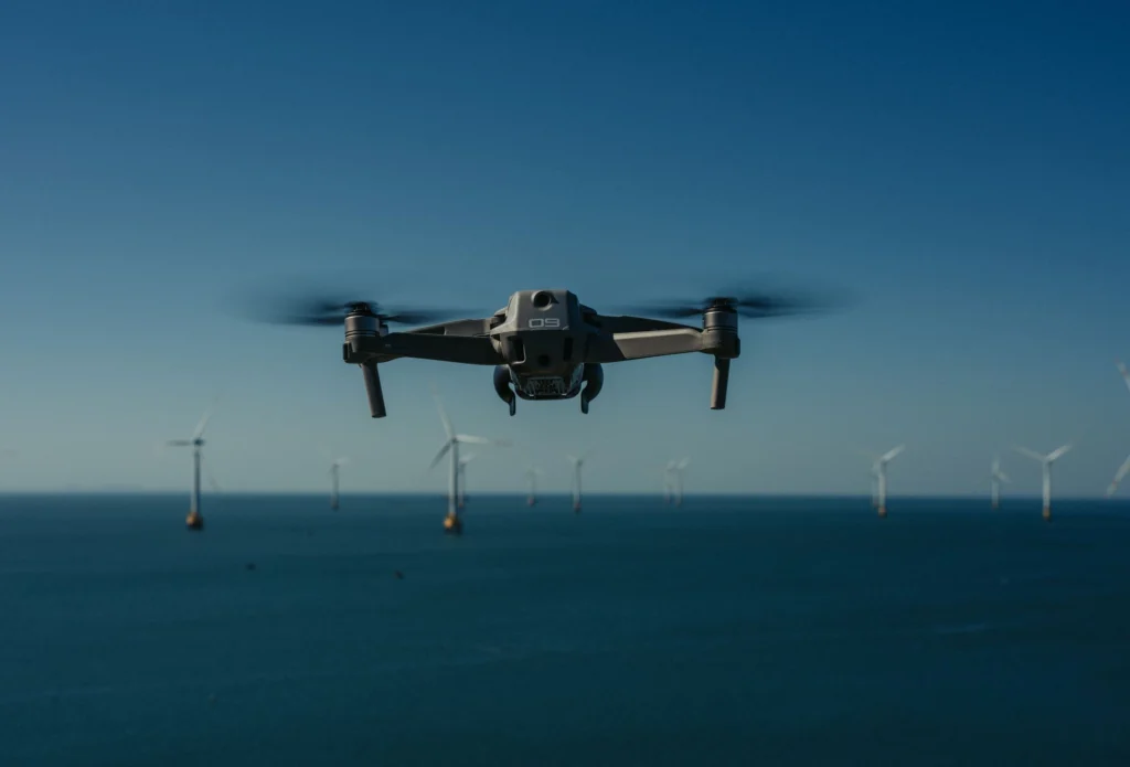 Drone flying over an offshore wind farm for inspection — Armando Colina Rojas, drone pilot